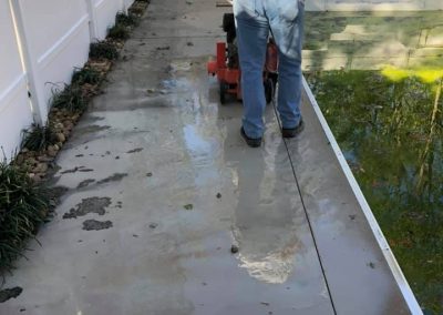 Concrete being cleaned up during the pool redo process.