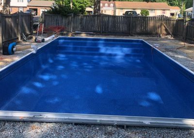 Progress photo after the new pool steps have been covered and a pool liner installation has been done.
