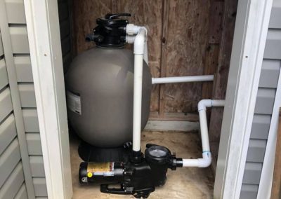 A storage room that was used for a new pool pump system to be hooked up to redo a pool.